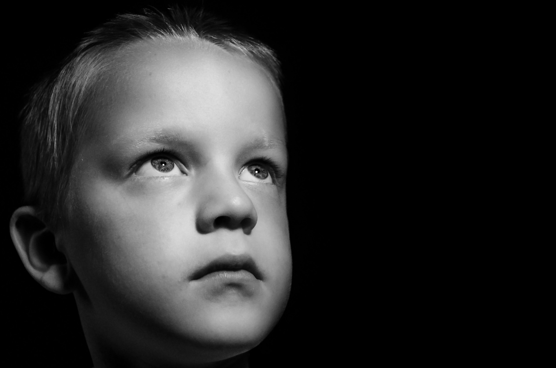 Black and white portrait of a serious boy free image download