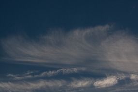 clouds in the grey sky as background