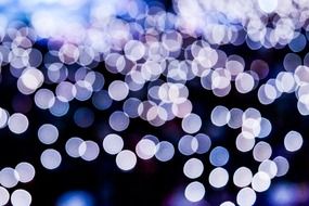 background with white and purple blurred lights