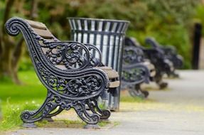 bench park sidewalk road campus