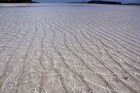 water background smooth waves pebble