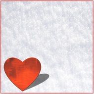 red heart on the snowy surface