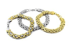 three white and yellow gold bracelets