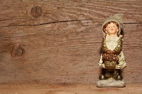 chalk figure on the background of a wooden wall