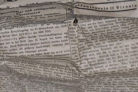 crumpled old newspaper, detail close up