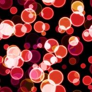 pink and red bubbles on the black background