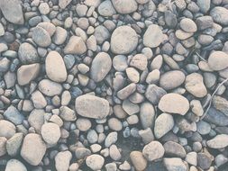 stones pebbles beach sea grey