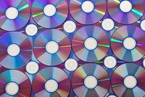 background with repeating compact disks