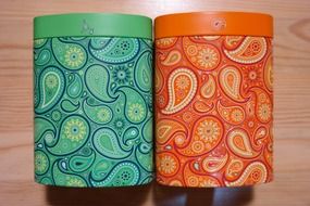 two colorful cans for tea