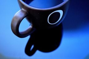 brown mug of coffee