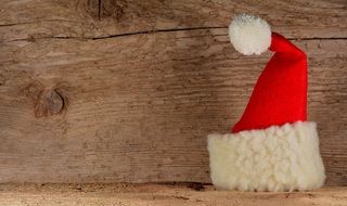 christmas deco santa hat wood background