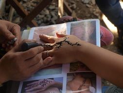 henna tattoo art hand design