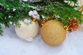 Christmas baubles on the snow