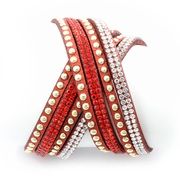 red bracelet with metal rivets