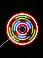 colorful neon circles on a black background