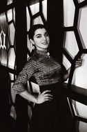 black and white photo of a smiling model