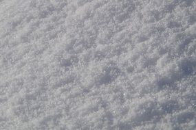 white snow crystals as background