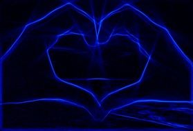 hand heart gesture on a black background