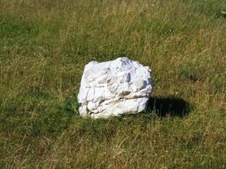 white cobblestone on the grass