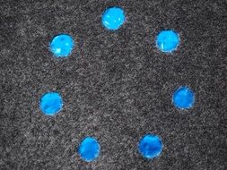 blue circles on the felt
