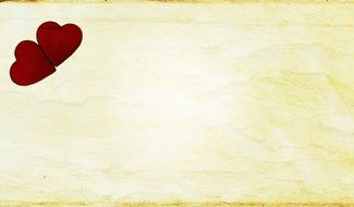clipart of two red hearts on a vintage background