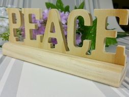 flowers and wood decorative element peace