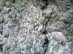 rocks solid grey black hard rough