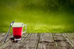 raining weather and cup of hot tea
