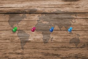 wood board structure map of the world colorful needles