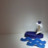 blue toy sailing boat