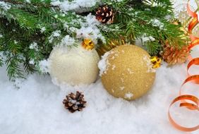background with Christmas balls in snow