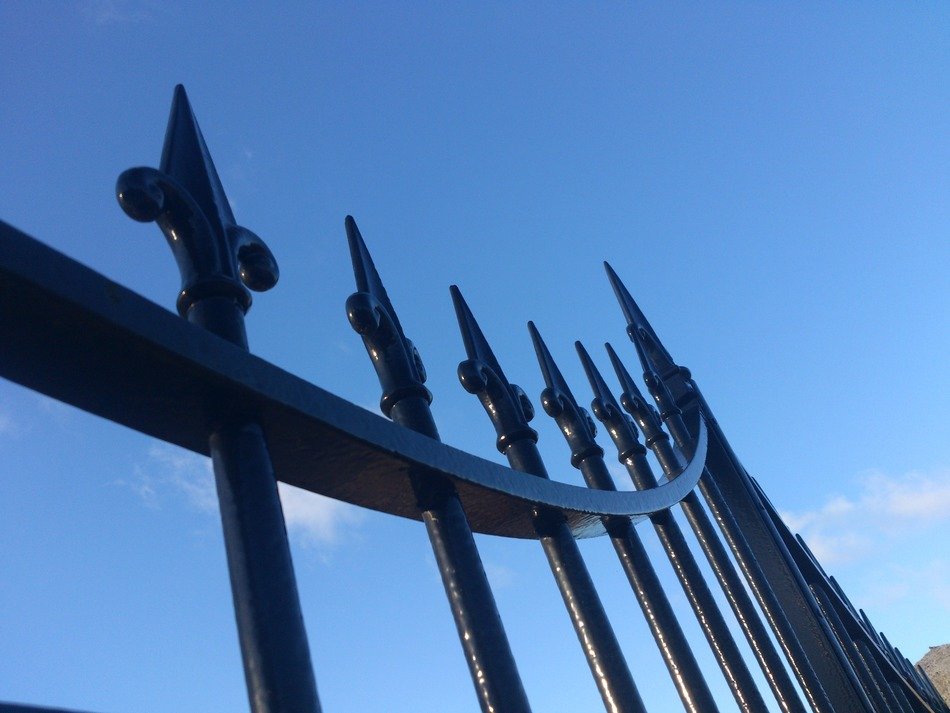 fences iron pattern black old sky