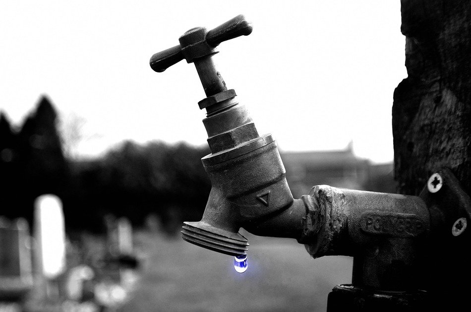 tap water drop background garden