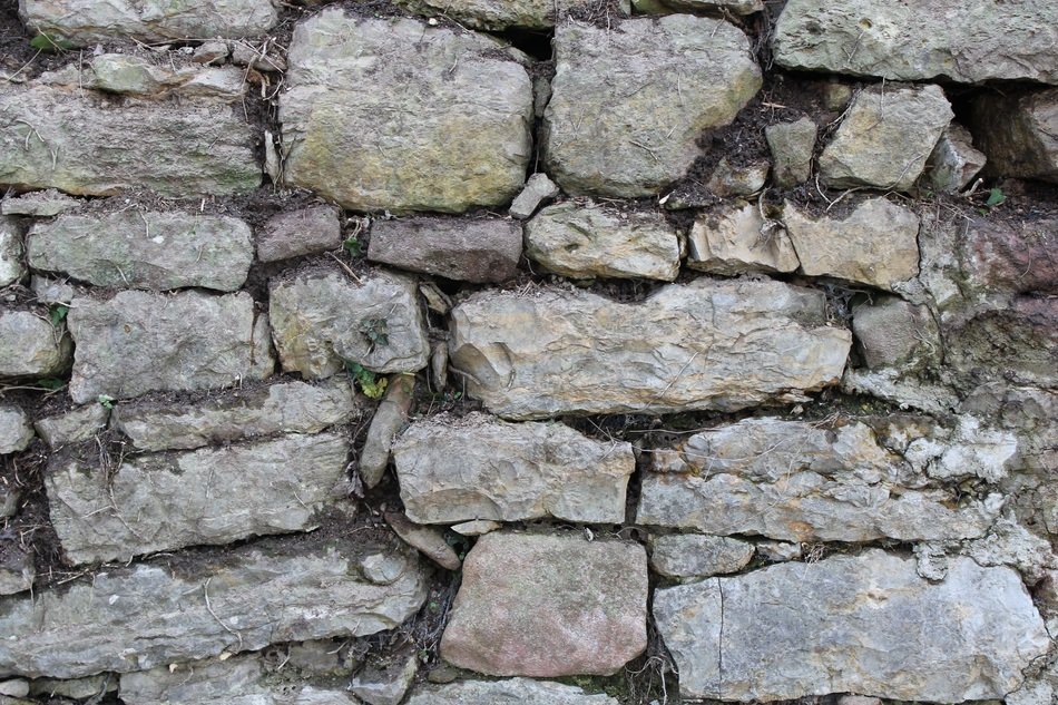 photo of grey stone wall