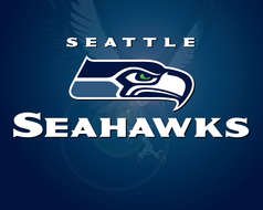 Seattle Seahawks logo on a dark background