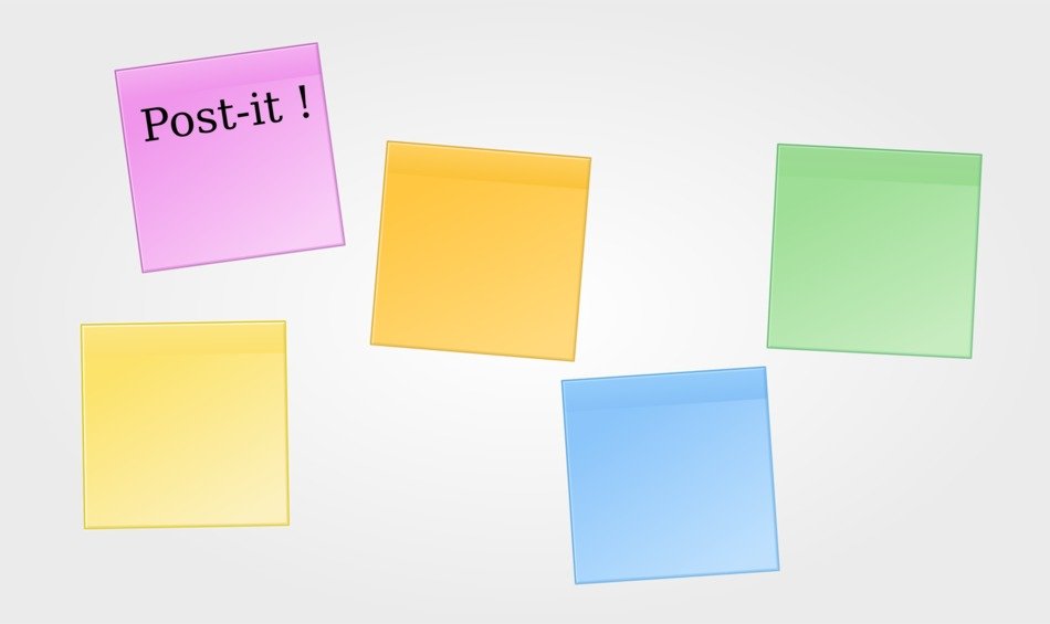 leaflets of different colors on a white background