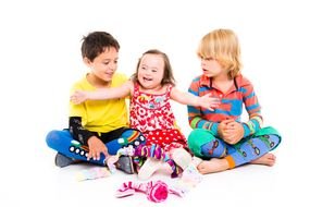 children with disabilities play with toys