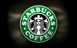 Starbucks coffe, Logo at dark blurred background