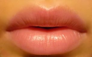 lips of a girl with pink lipstick