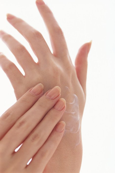 Dry Skin, cream on female Hands