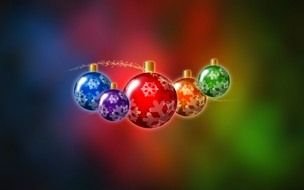 five christmas balls on a colorful background