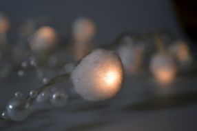 grey background with illuminated balls