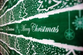 green wallpaper with Christmas motif