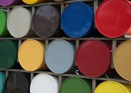 multicolored cans of paint
