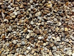 rocks pebbles road pedestrians