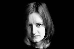 black and white portrait of a sad woman