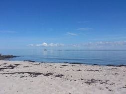 beach sea water sand sky ship