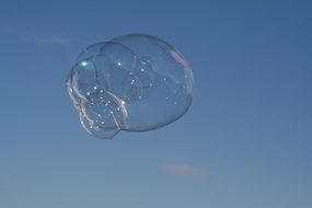 soap bubble against a background of blue sky