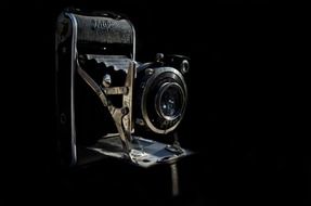 old camera on a black background