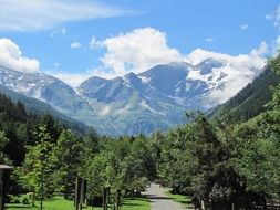 austria mountains sky blue clouds
